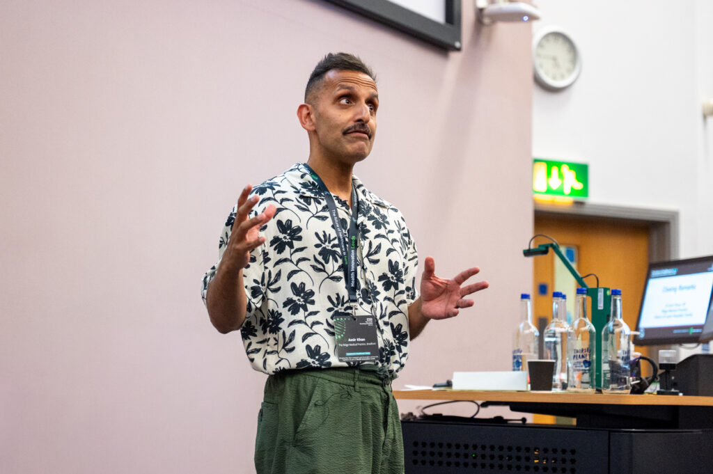 Dr Amir Khan speaking at the Leeds Research and Innovation Conference
